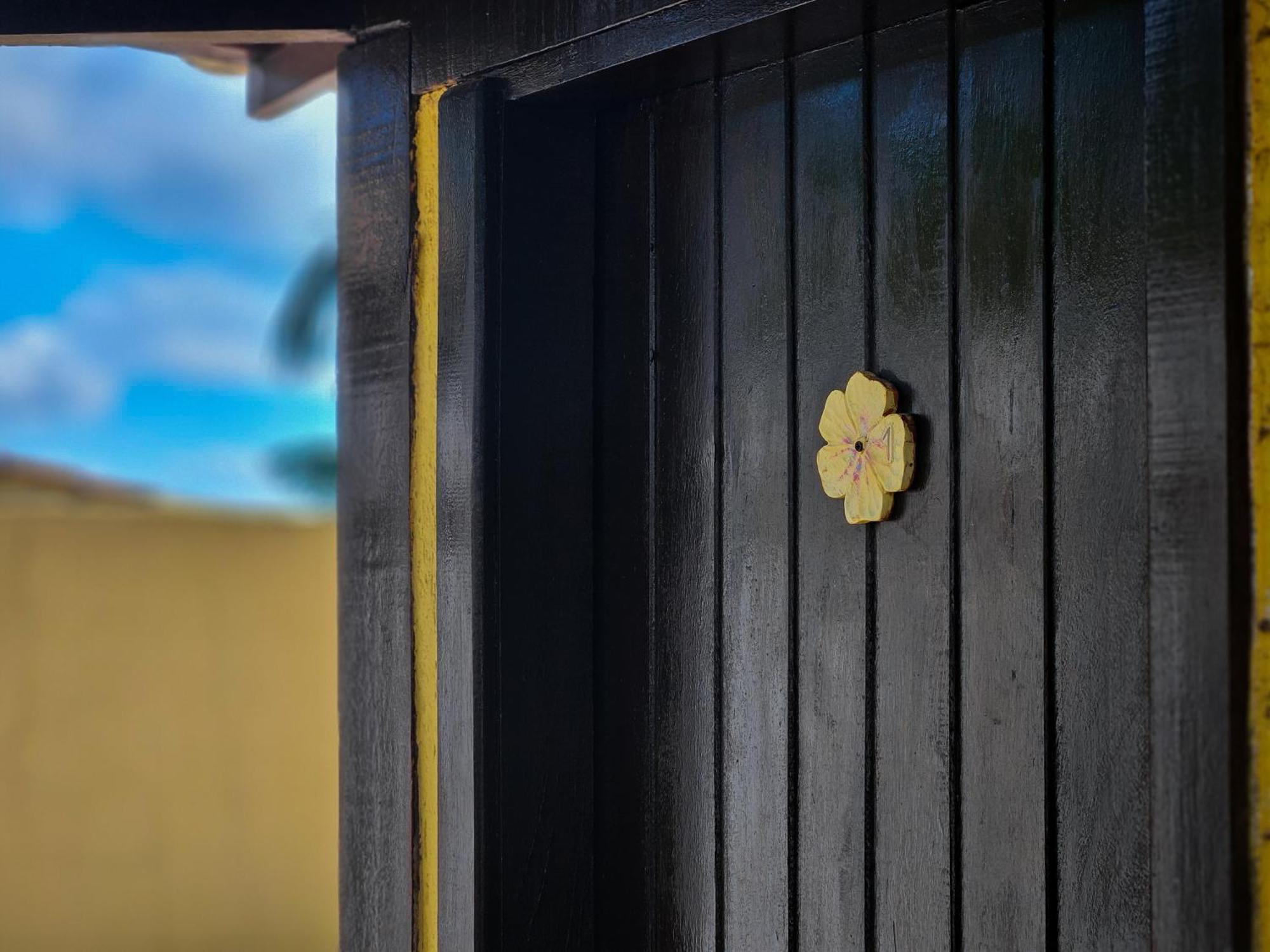Bliss Hotéis Bella Vista Búzios Extérieur photo A golden flower-shaped knob on a door
