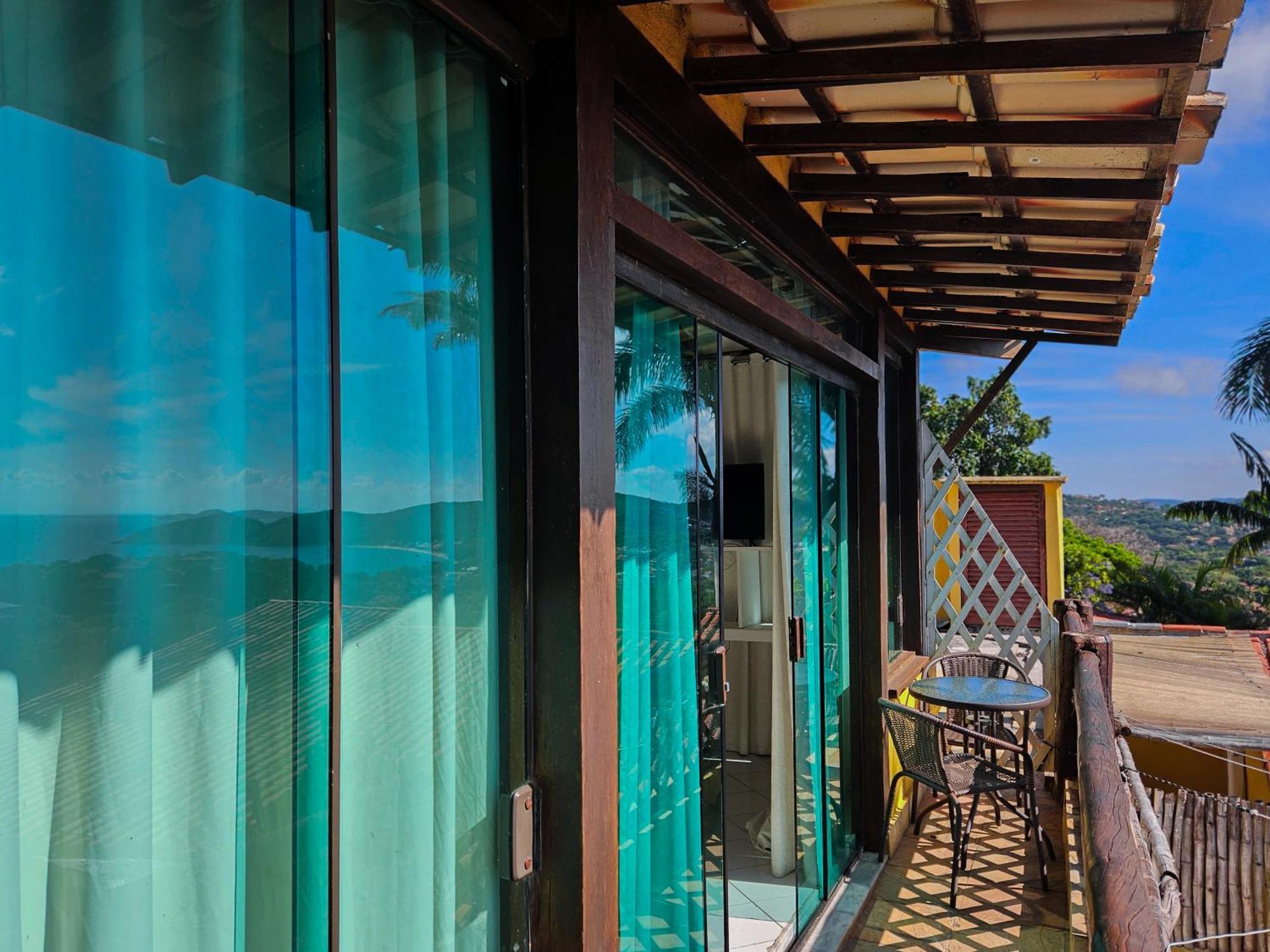 Bliss Hotéis Bella Vista Búzios Extérieur photo A glass house in the Philippines